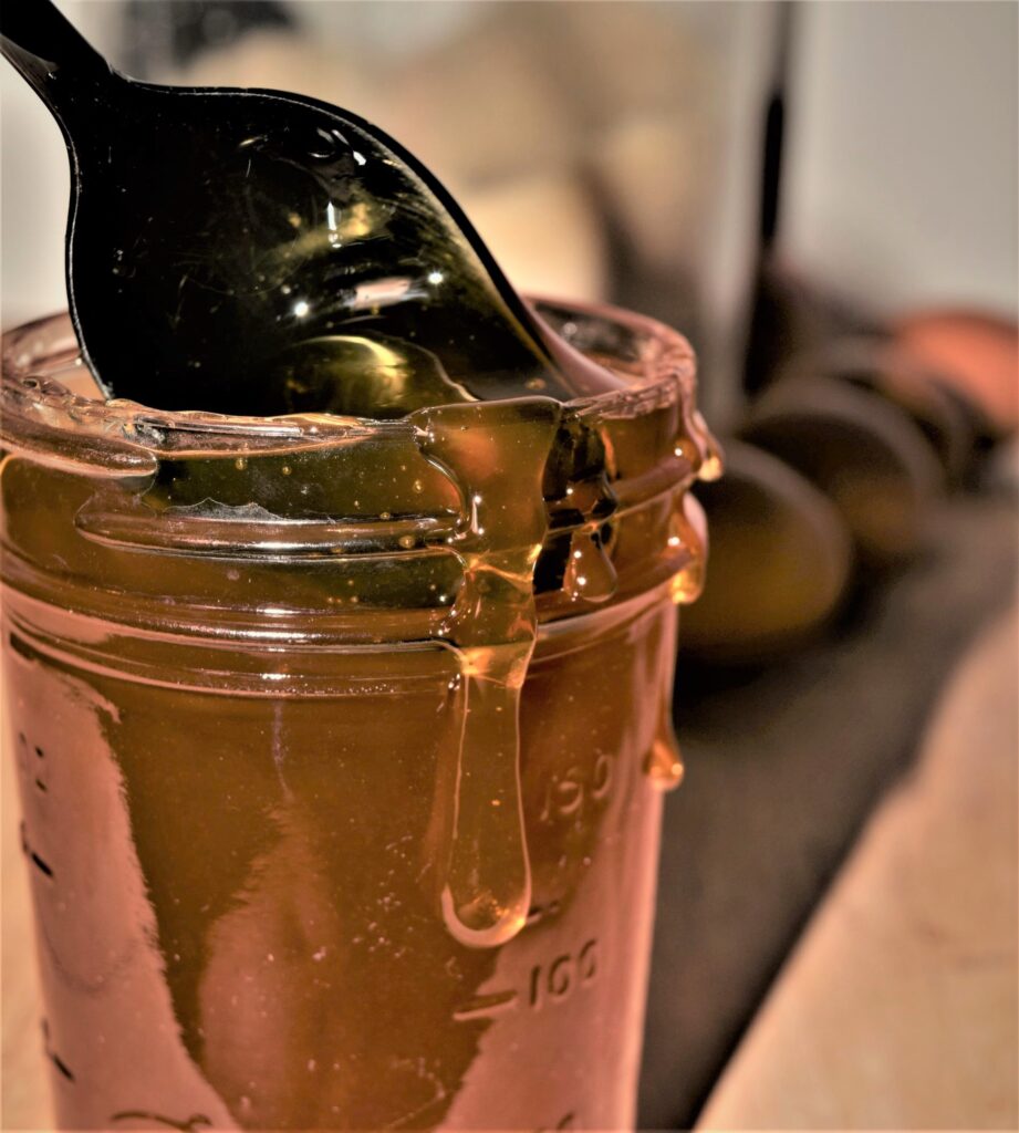 golden honey black spoon art photography cooking baking mason jar