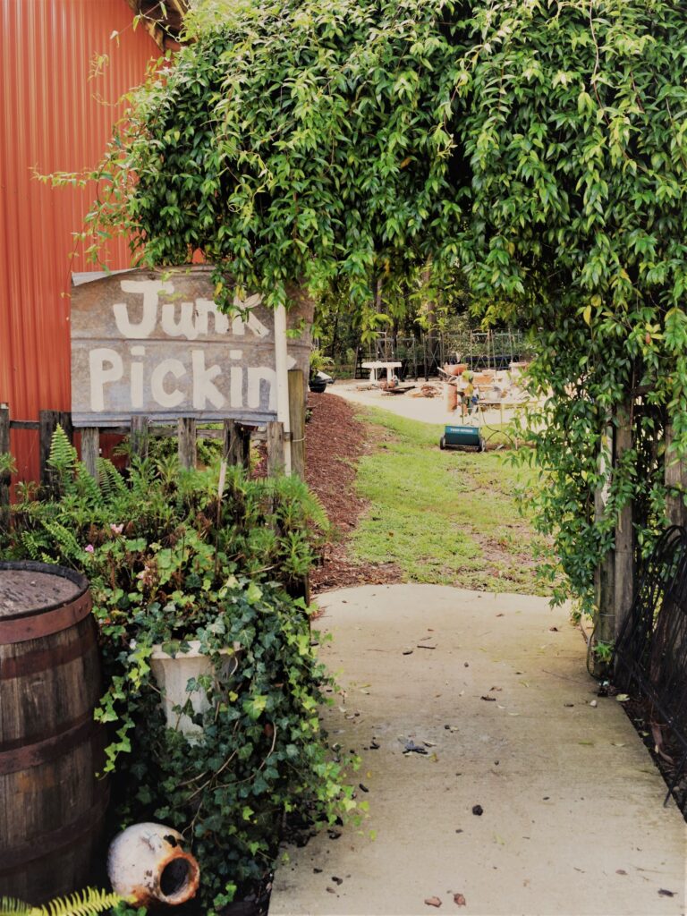 junk sign vintage covered walkway path explore antiques cute junkyard