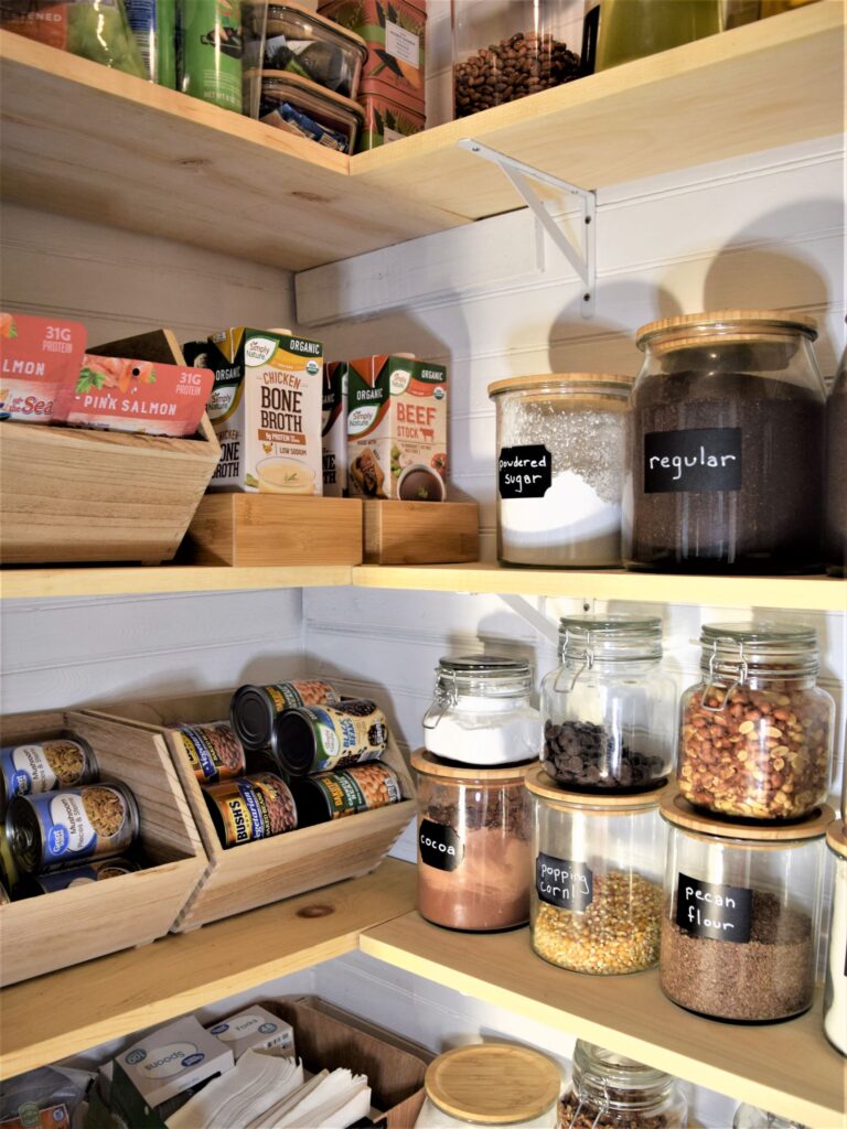 small farmhouse pantry organization black white wood tiny labels jars renovation diy