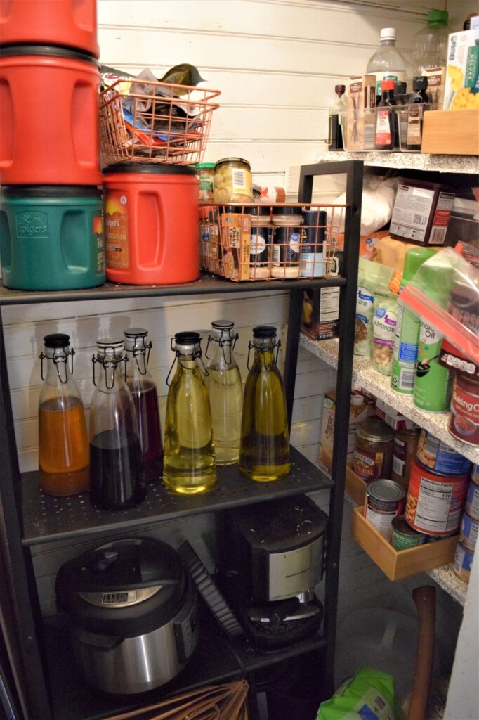 small farmhouse pantry organization black white wood tiny labels jars renovation diy