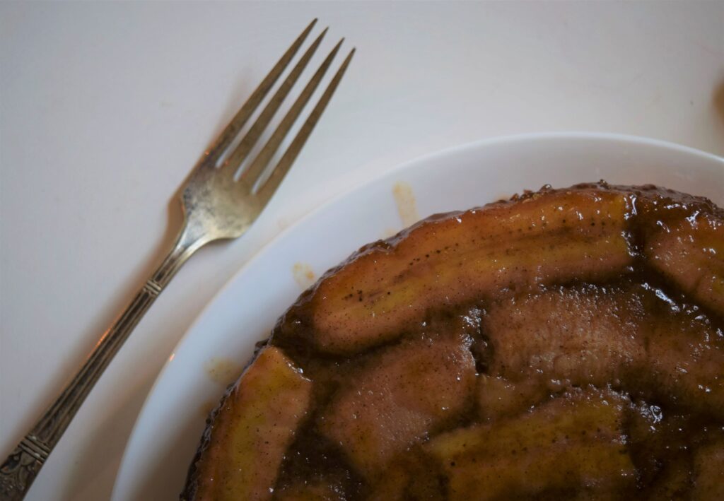Bananas Foster Upside Down Cake with silver fork