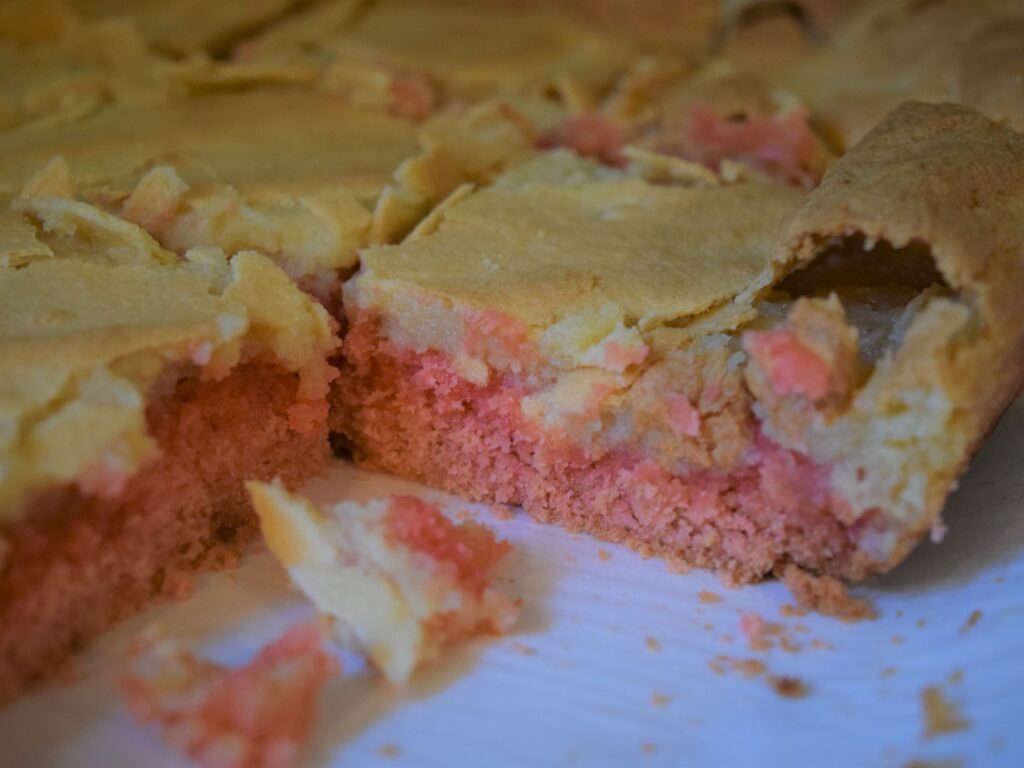 Strawberry Ooey-Gooey Butter Bars, close up texture, crumb, pink